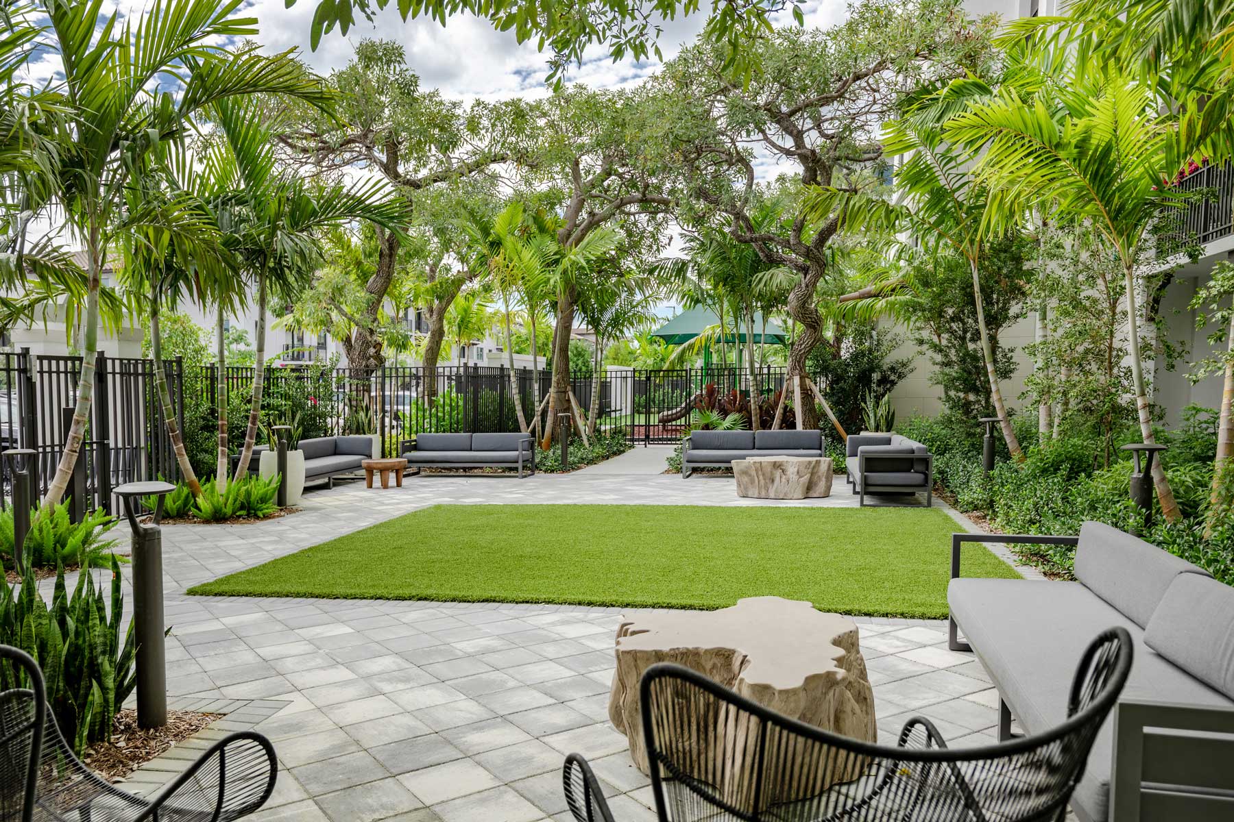 On-site park with ample greenery and seating at CasaMara