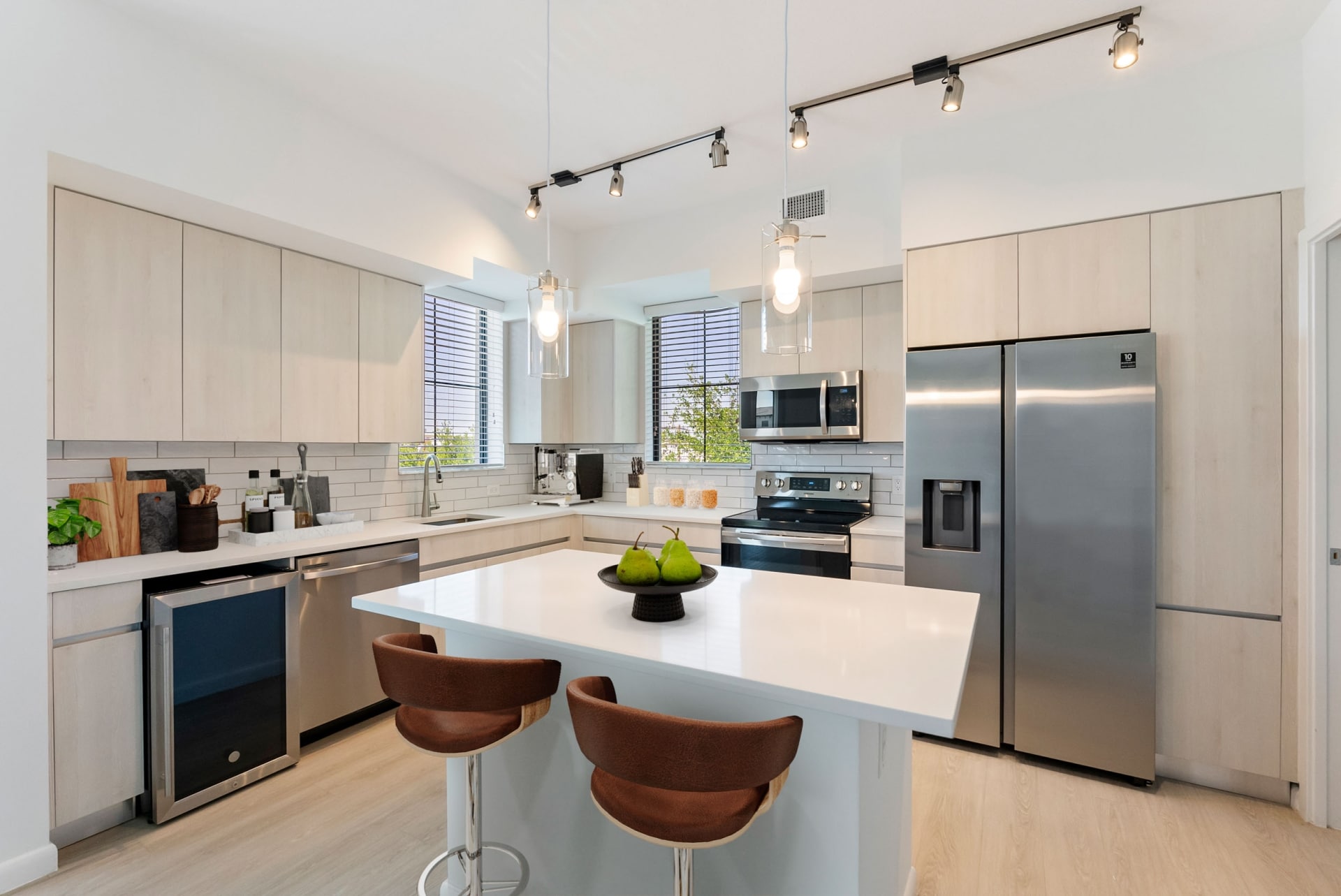Modern kitchens inside apartment homes at Casa Mara